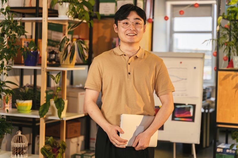 Zupas team member smiling at the cafe